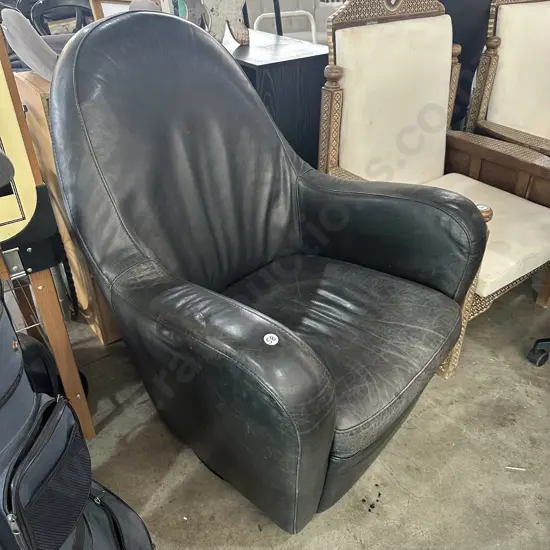 Natuzzi swivel leather chair