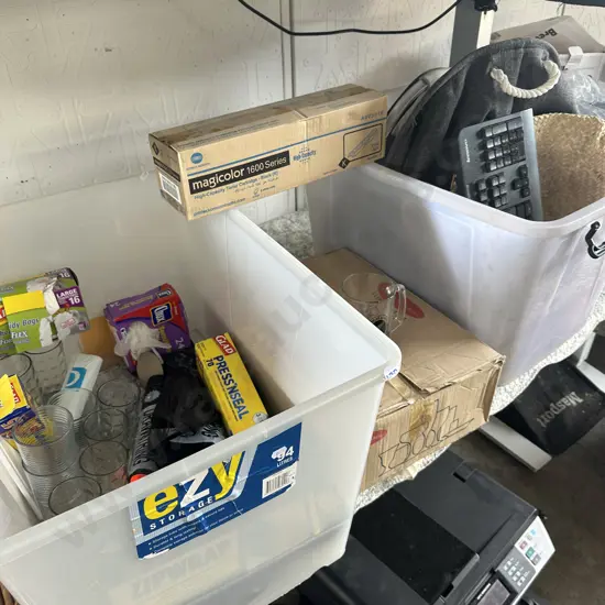 Two bins of cutlery, black rubbish bags, glasses, beer handles etc.