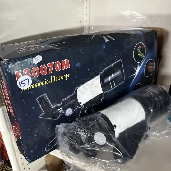 telescope boxed and unused plus an Ereader (needs power supply)