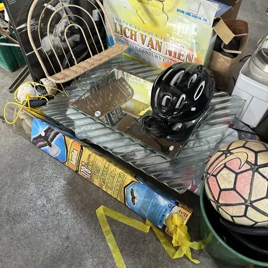 Bay lot mirror, shelf, boogie board, kite, bike helmet, ball and bucket etc.