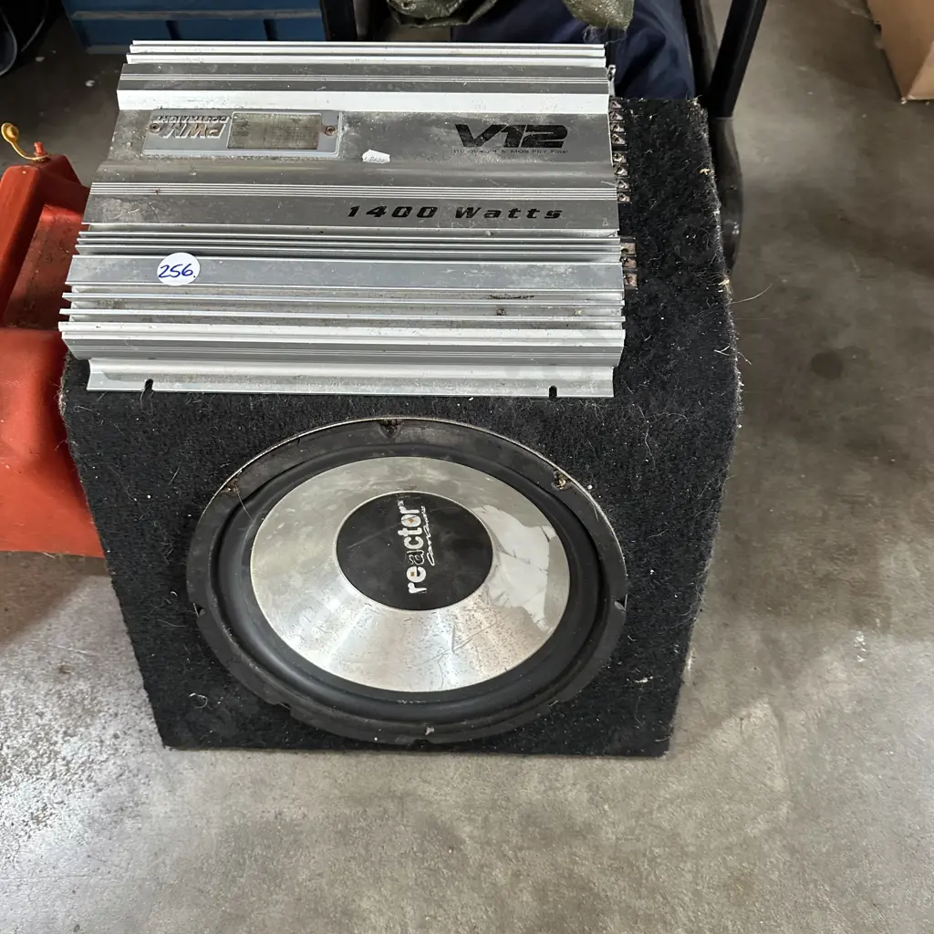 Sub woofer and amplifier. (no cables) plus petrol can. Image 1++