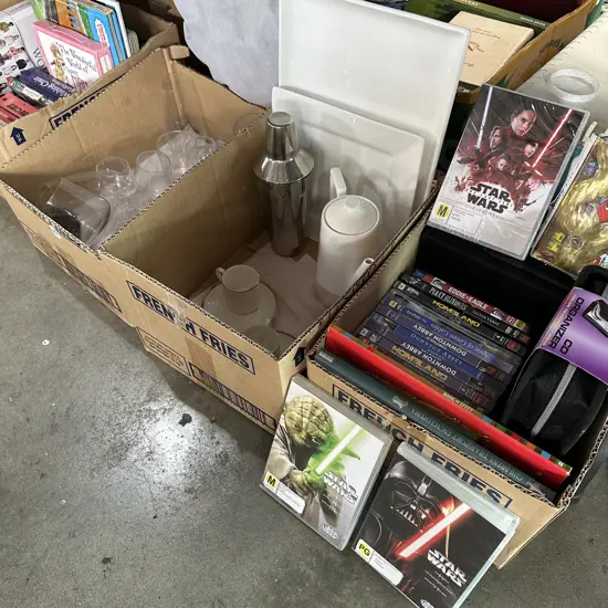 Four boxes glasses, books, DVD movies including Star Wars. Etc.