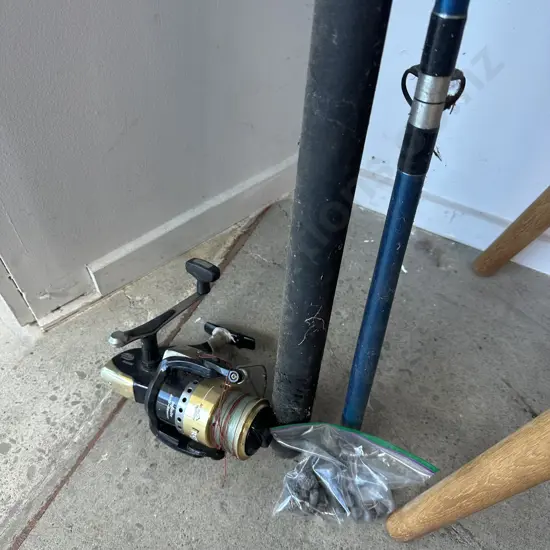 surf-caster with Jarvis walker reel and  sinkers