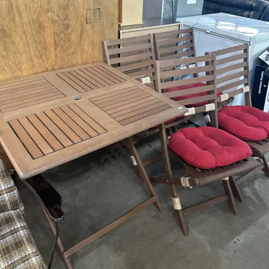 as new folding outdoor table and 4 chairs