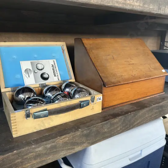 Petanque and wooden box for storing letters