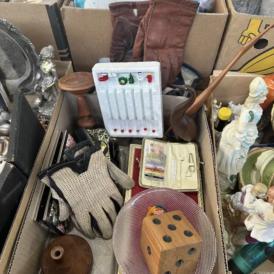 Box of collectables including wooden items and vintage gloves etc.