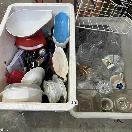 Two bins glassware, vintage scales, kitchen utensils etc.
