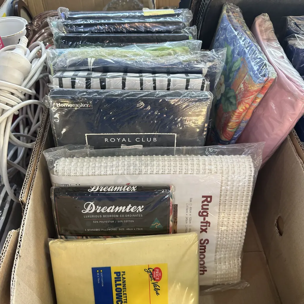 Mix of new Single, double and king quilt covers, sheet sets, pillowcases and new rug-fix. Image 1++