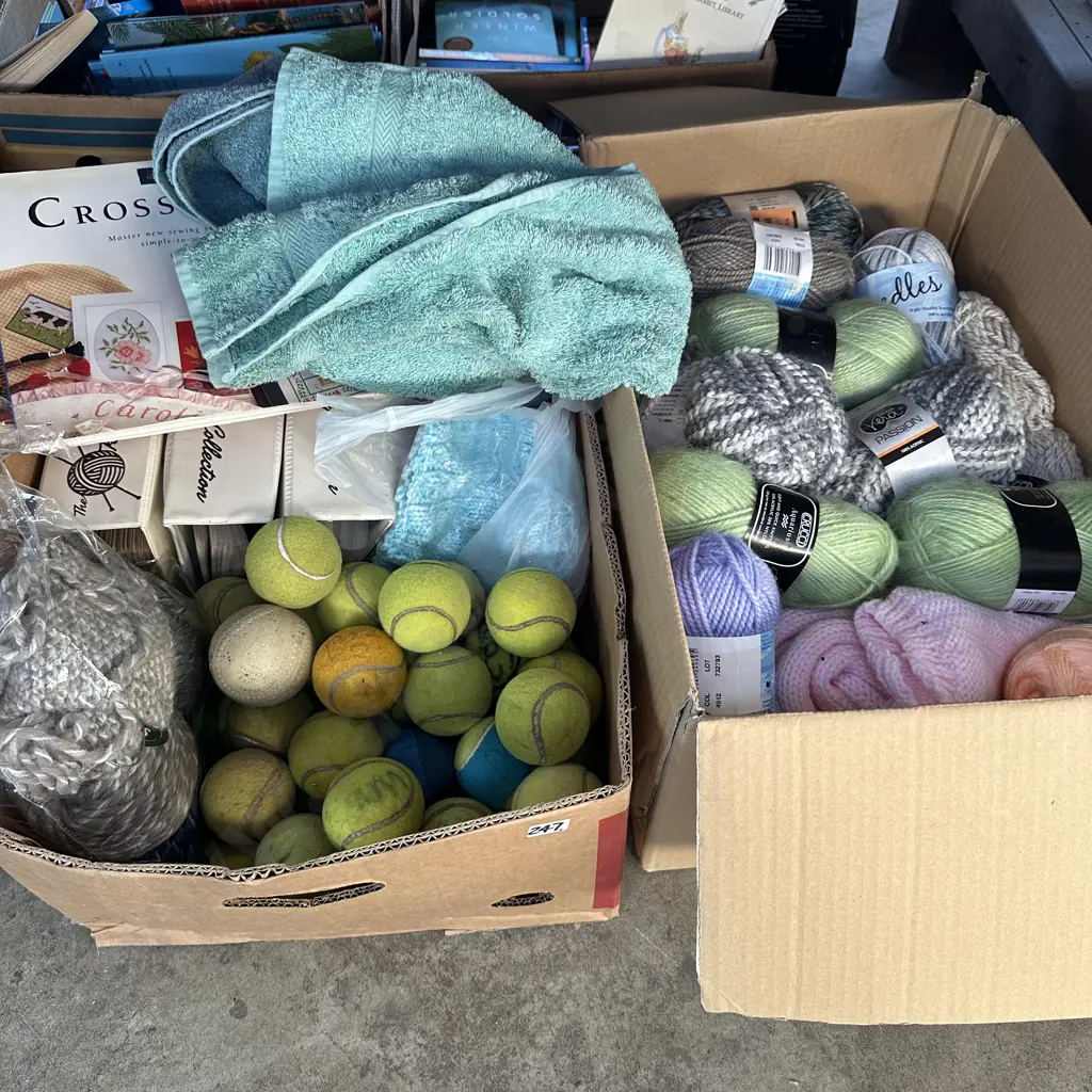 Two boxes wool, tennis balls and towels etc. Image 1++