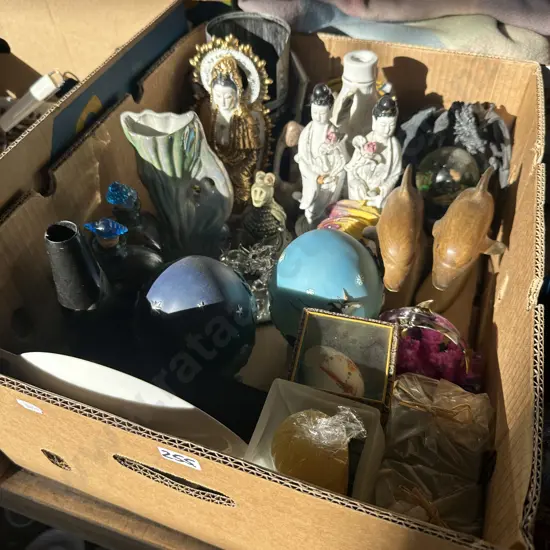 Box of figures and candles etc.