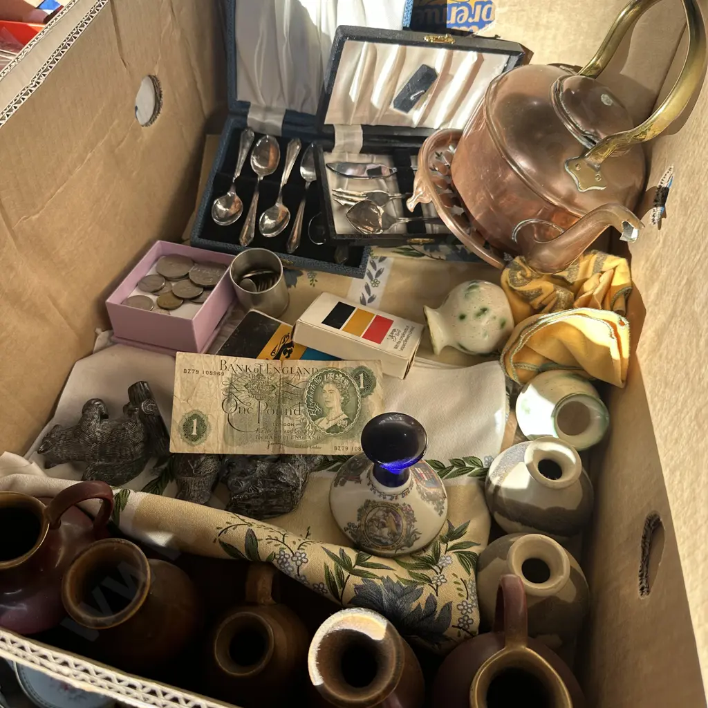 Box of silver spoons, coins, copper kettle, one pound note etc. Image 1++
